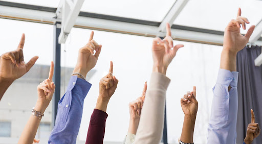 fingers pointing at the top | hoa election of officers